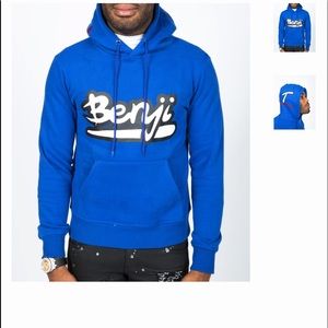 A blue Tulones hoodie .